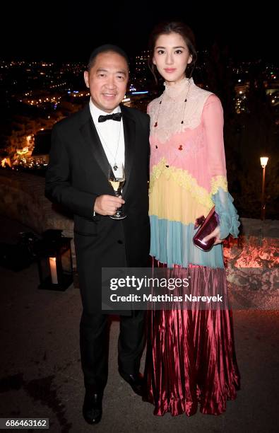 Dennis Chan and Fan Bingbing attend the Women in Motion Awards Dinner at the 70th Cannes Film Festival at Place de la Castre on May 21, 2017 in...