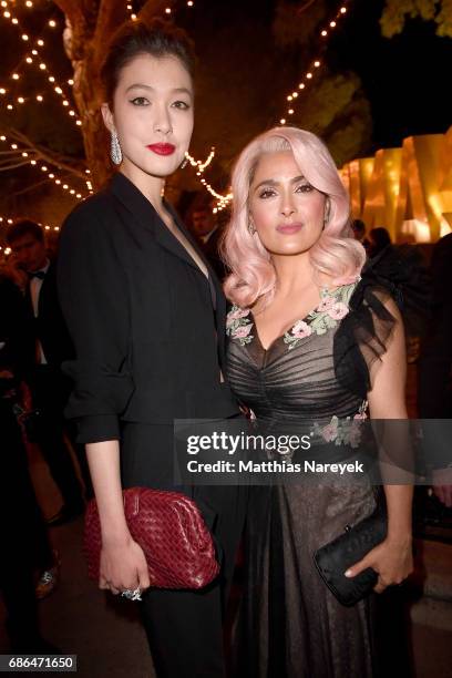 Kouka Webb and Salma Hayek attend the Women in Motion Awards Dinner at the 70th Cannes Film Festival at Place de la Castre on May 21, 2017 in Cannes,...