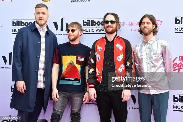 Musicians Dan Reynolds, Ben McKee, Daniel Platzman, and Wayne Sermon of Imagine Dragons attend the 2017 Billboard Music Awards at T-Mobile Arena on...