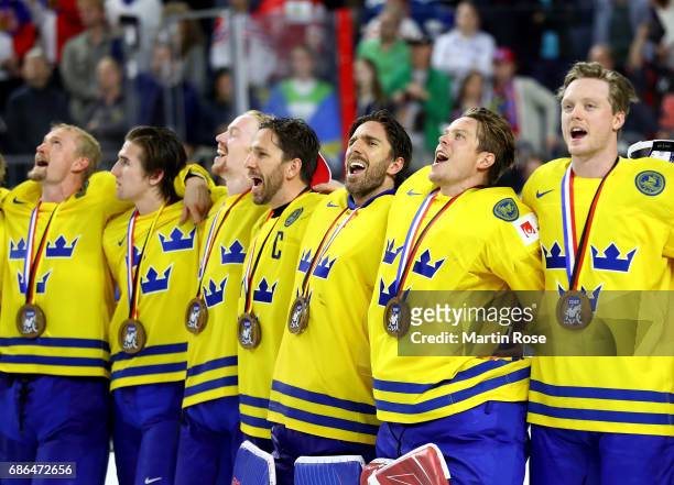 Joel Lundqvist and Henrik Lundqvist of Sweden celebrate victory over Canada after the 2017 IIHF Ice Hockey World Championship Gold Medal game Canada...