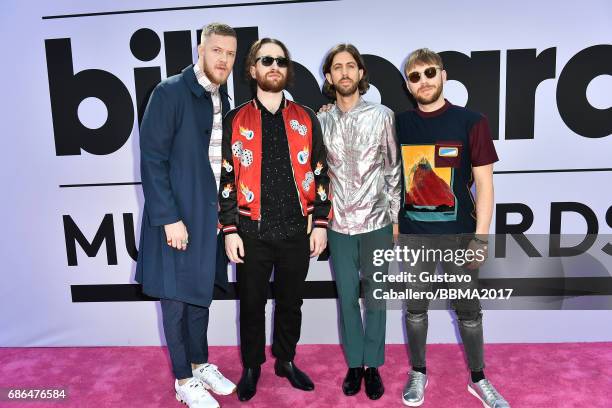 Musicians Dan Reynolds, Ben McKee, Daniel Platzman and Wayne Sermon of Imagine Dragons attend the 2017 Billboard Music Awards at T-Mobile Arena on...