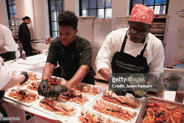 Chefs prepare food at the TNT Supper Club: Will Dinner event during TNT at Vulture Festival at West Edge on May 21, 2017 in New York City. 27031_001