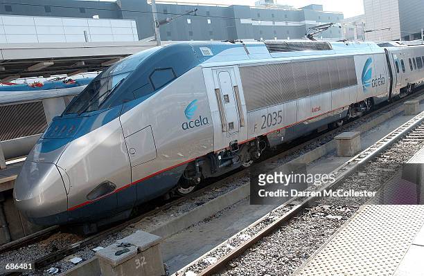 An Acela Express train sits parked December 10, 2001 at South Station in Boston Massachusetts. Amtrak recently added a ninth daily Express train to...