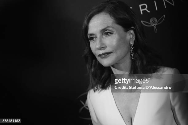 Actress Isabelle Huppert attends Women In Motion Kering And Cannes Film Festival Official Dinner Photocall during the 70th Cannes Film Festival on...