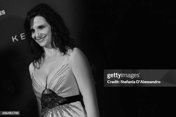 Actress Juliette Binoche attends Women In Motion Kering And Cannes Film Festival Official Dinner Photocall during the 70th Cannes Film Festival on...