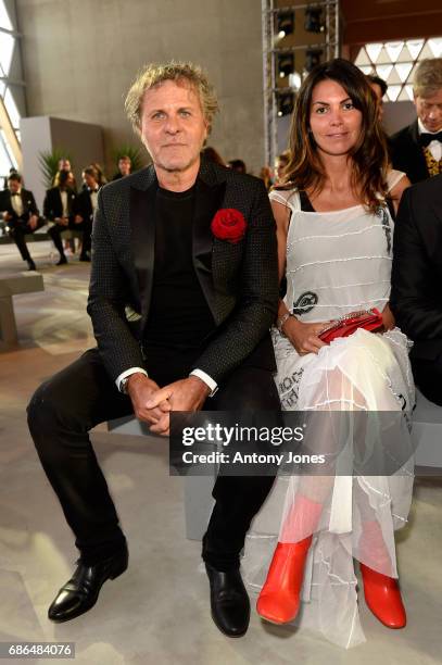 Renzo Rosso and Arianna Alessi attend the Fashion for Relief event during the 70th annual Cannes Film Festival at Aeroport Cannes Mandelieu on May...