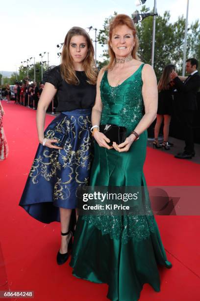 Sarah Ferguson, Duchess of York and Princess Beatrice of York attends the Fashion for Relief event during the 70th annual Cannes Film Festival at...