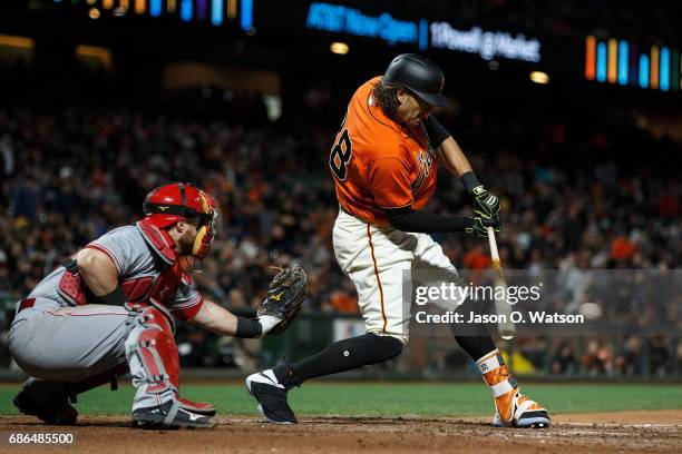 Michael Morse of the San Francisco Giants at bat against the Cincinnati Reds during the tenth inning at AT&T Park on May 12, 2017 in San Francisco,...