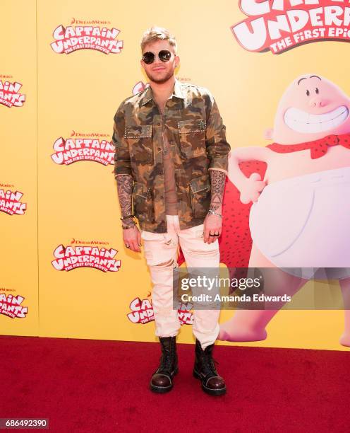 Singer Adam Lambert arrives at the premiere of 20th Century Fox's "Captain Underpants: The First Epic Movie" at the Regency Village Theatre on May...