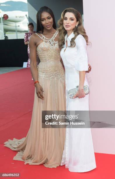 Jordan's Queen Rania and Naomi Campbell attend the Fashion for Relief event during the 70th annual Cannes Film Festival at Aeroport Cannes Mandelieu...
