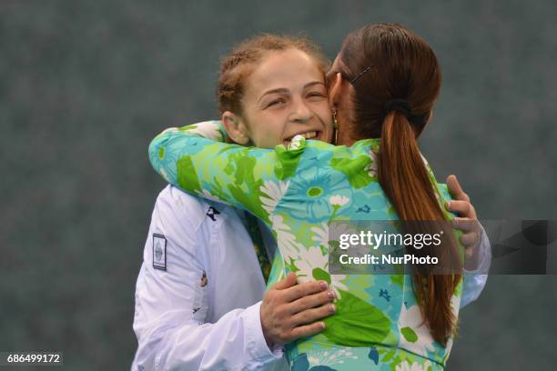 Azerbaijan's Mariya Stadnik receives congratulations and a hug from Azerbaijan's Vice President and First Lady Mehriban Aliyeva after the Women's...