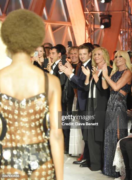 Nicola Formichetti, Renzo Rosso, Jeremy Renner, Trudie Styler and Donatella Versace attend the Fashion for Relief event during the 70th annual Cannes...