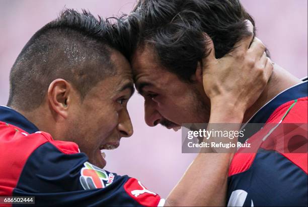 Edwin Hernandez and Oswaldo Alanis of Chivas celebrate after a goal scored by their teammate Nestor Calderon during the semi final second leg match...