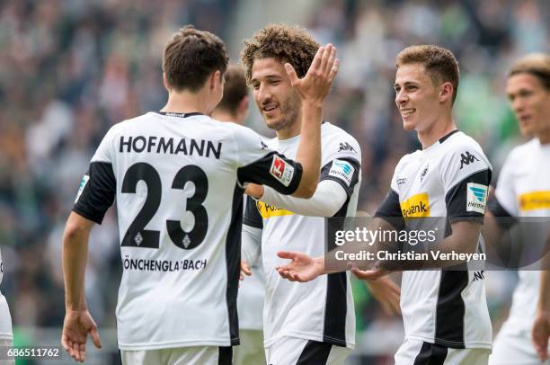 May 20: Thorgan Hazard of Borussia Moenchengladbach celebrate with his team mates Jonas Hofmann and Fabian Johnson after he scores his teams first...