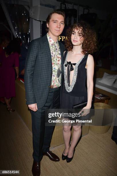 Paul Dano and Lily Collins attend the Hollywood Foreign Press Association's 2017 Cannes Film Festival Event in honour of the International Rescue...