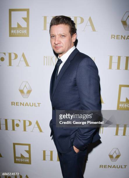 Jeremy Renner attends the Hollywood Foreign Press Association's 2017 Cannes Film Festival Event in honour of the International Rescue Committee...