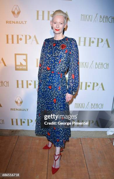 Tilda Swinton attends the Hollywood Foreign Press Association's 2017 Cannes Film Festival Event in honour of the International Rescue Committee...