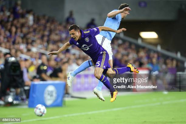 Donny Toia of Orlando City SC and RJ Allen of New York City FC collide in the air during a MLS soccer match between New York City FC and the Orlando...