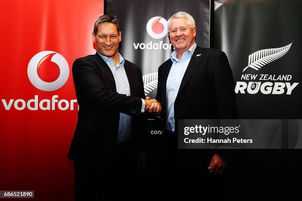 Vodafone Chief Executive Russell Stanners shakes hands with New Zealand Rugby CEO Steve Tew during a New Zealand All Blacks sponsorship Announcement...