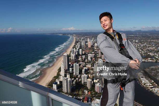 Badminton player Shi Yuqi of China poses on the Skydeck walk at the Skypoint Observation Deck on May 22, 2017 in Gold Coast, Australia. Today,...