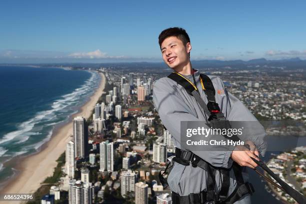 Badminton player Shi Yuqi of China poses on the Skydeck walk at the Skypoint Observation Deck on May 22, 2017 in Gold Coast, Australia. Today,...