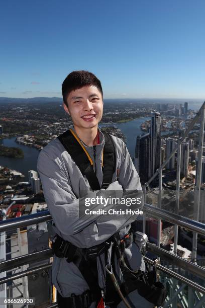 Badminton player Shi Yuqi of China poses on the Skydeck walk at the Skypoint Observation Deck on May 22, 2017 in Gold Coast, Australia. Today,...