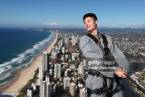 Badminton player Shi Yuqi of China poses on the Skydeck walk at the Skypoint Observation Deck on May 22, 2017 in Gold Coast, Australia. Today,...