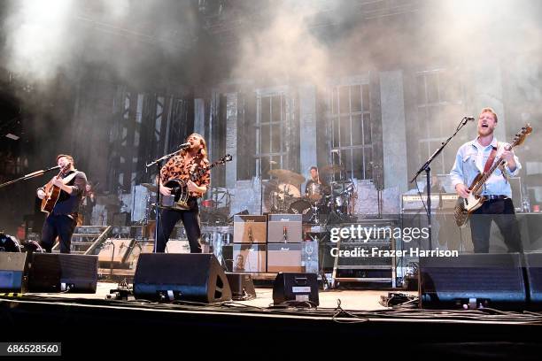 Musicians Marcus Mumford, Winston Marshall and Ted Dwane of the band Mumford & Sons perform at the Hangout Stage during 2017 Hangout Music Festival...