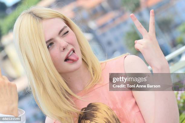 Elle Fanning attends the "How To Talk To Girls At Parties" Photocall during the 70th annual Cannes Film Festival at Palais des Festivals on May 21,...