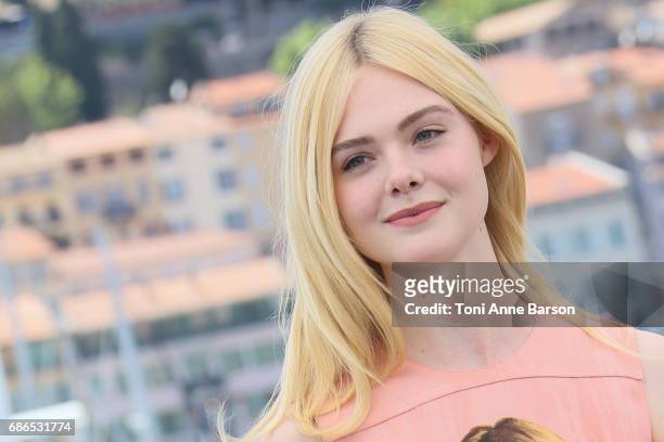 Elle Fanning attends the "How To Talk To Girls At Parties" Photocall during the 70th annual Cannes Film Festival at Palais des Festivals on May 21,...