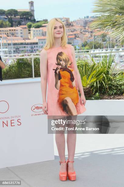 Elle Fanning attends the "How To Talk To Girls At Parties" Photocall during the 70th annual Cannes Film Festival at Palais des Festivals on May 21,...