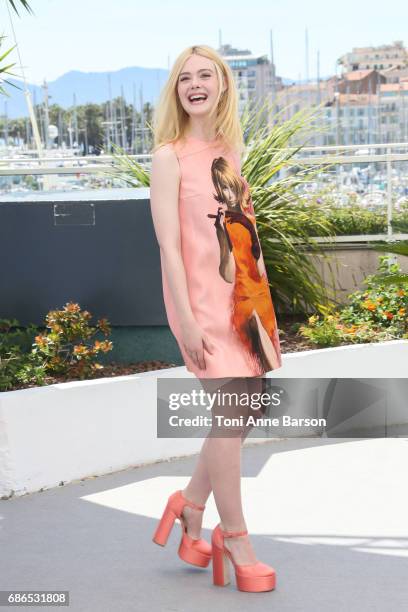 Elle Fanning attends the "How To Talk To Girls At Parties" Photocall during the 70th annual Cannes Film Festival at Palais des Festivals on May 21,...