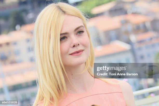 Elle Fanning attends the "How To Talk To Girls At Parties" Photocall during the 70th annual Cannes Film Festival at Palais des Festivals on May 21,...