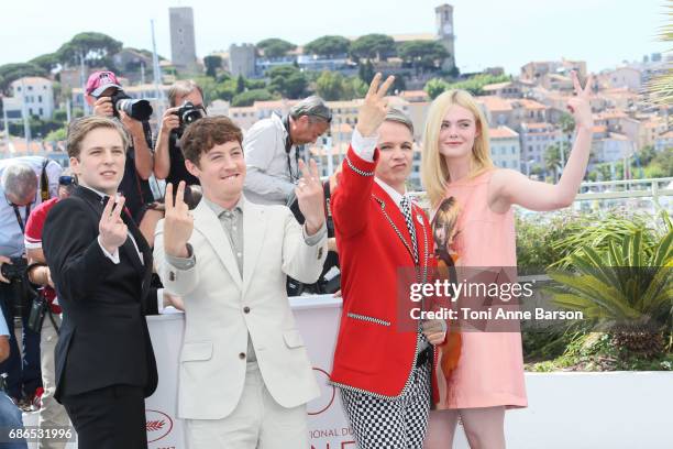 Actors AJ Lewis, Alex Sharp, Elle Fanning and director John Cameron Mitchell attend the "How To Talk To Girls At Parties" Photocall during the 70th...