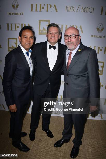 Member Munawar Hosain, Netflix Chief Content Officer Ted Sarandos and HFPA President Lorenzo Soria attends the Hollywood Foreign Press Association's...