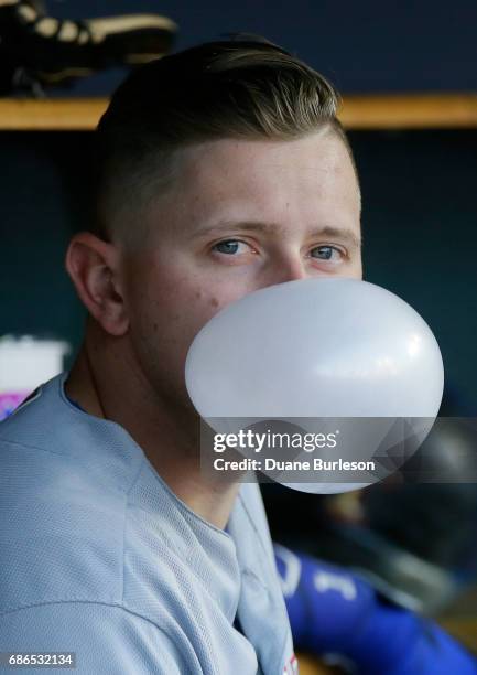 Ryan Rua of the Texas Rangers blows a bubble during the first inning of a game against the Detroit Tigers at Comerica Park on May 21, 2017 in...