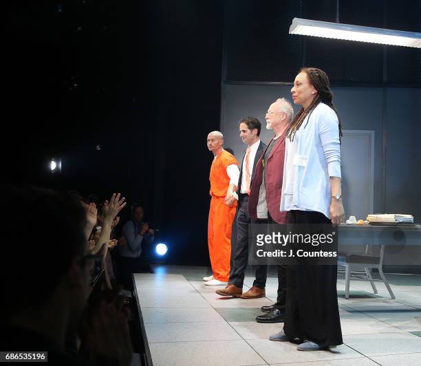 Actor James Badge Dale, director Ari Edelson, playwright Robert Schenkkan and actress Tamara Tunie take a bow during curtain call on the opening...