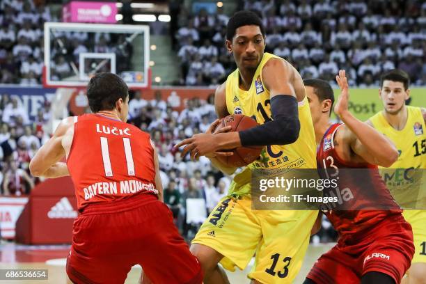 Vladimir Lucic of Munich Nick Johnson of Munich und Malcolm Miller of Berlin battle for the ball during the easyCredit BBL Basketball Bundesliga...