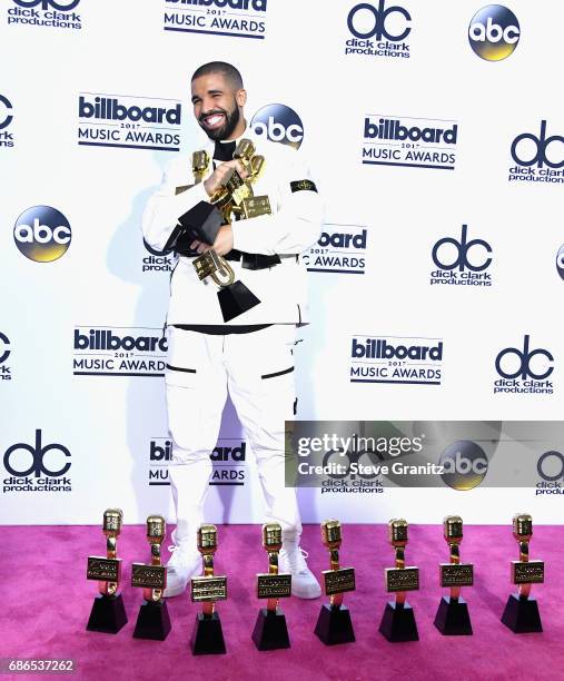 Drake poses with awards at the 2017 Billboard Music Awards at T-Mobile Arena on May 21, 2017 in Las Vegas, Nevada.