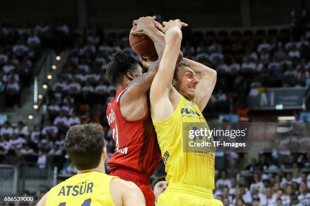 Devin Booker of Munich und Bogdan Radosavljevic of Berlin battle for the ball during the easyCredit BBL Basketball Bundesliga match between FC Bayern...