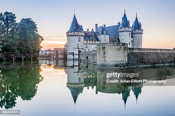 the chateau de sully-sur-loire in france. - loiret stock pictures, royalty-free photos & images