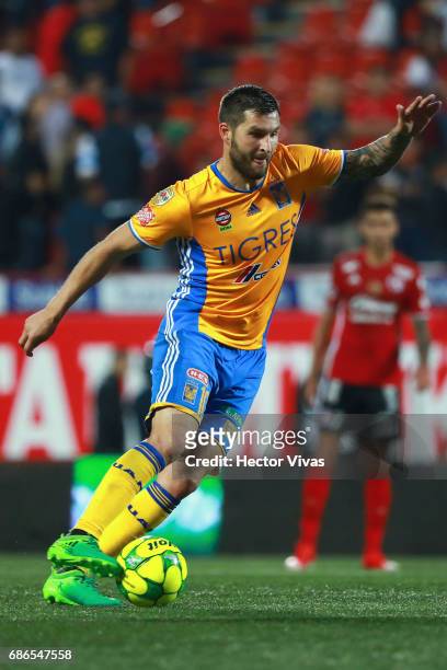 Andre Pierre Gignac of Tigres drives the ball during the semi finals second leg match between Tijuana and Tigres UANL as part of the Torneo Clausura...