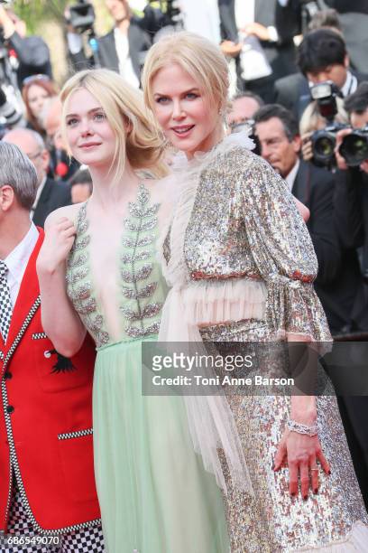 Elle Fanning and Nicole Kidman attend the "How To Talk To Girls At Parties" screening during the 70th annual Cannes Film Festival at Palais des...