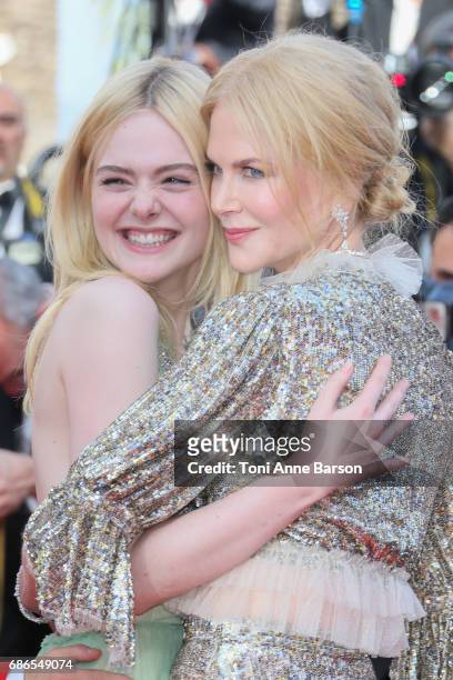 Elle Fanning and Nicole Kidman attend the "How To Talk To Girls At Parties" screening during the 70th annual Cannes Film Festival at Palais des...