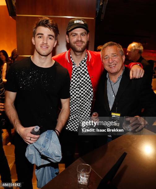 Andrew Taggart and Alex Paul of the Chainsmokers with Jaime Roberts visit the Virginia Black VIP lounge during the 2017 Billboard Music Awards at...