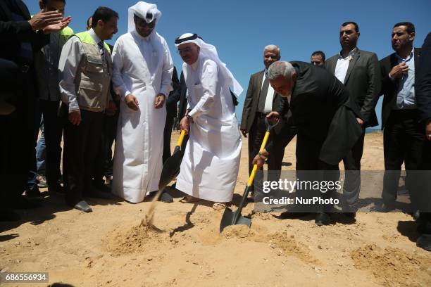 Ismail Haniyeh, leader of Hamas and Qatar's Ambassador to the Palestinian Authority, Mohammed Al Emadi attend the ceremony of establishment of the...