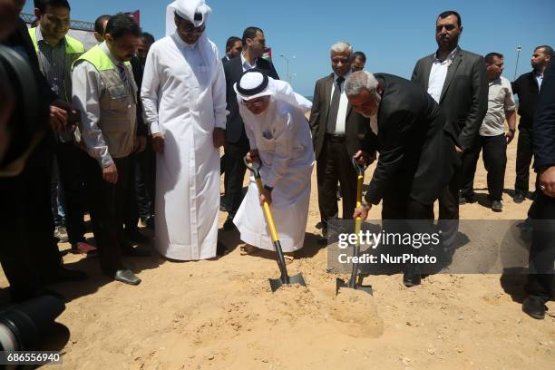 Ismail Haniyeh, leader of Hamas and Qatar's Ambassador to the Palestinian Authority, Mohammed Al Emadi attend the ceremony of establishment of the...