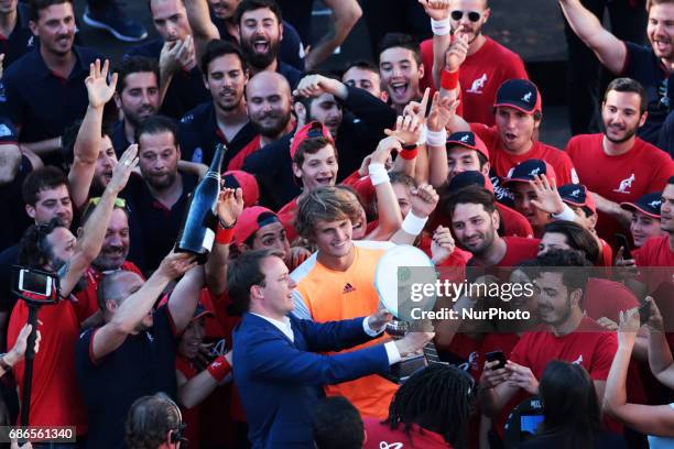 Alexander Zverev of Germany poses with the trophy after winning the ATP Singles Final match between Alexander Zverev of Germany and Novak Djokovic of...