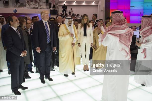 President Donald Trump , US First lady Melania Trump , Saudi Arabia's King Salman bin Abdulaziz al-Saud and Egyptian President Abdel Fattah el-Sisi...