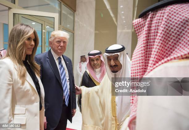 President Donald Trump , US First lady Melania Trump , Saudi Arabia's King Salman bin Abdulaziz al-Saud listen a briefing during the inauguration...